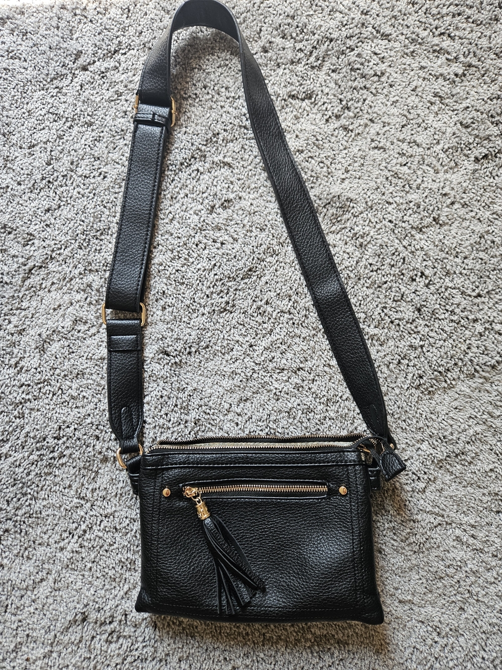 Black Leather Crossbody Bag with Tassel Accent